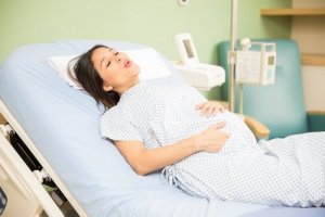Dilatation: Den første fase af fødslen